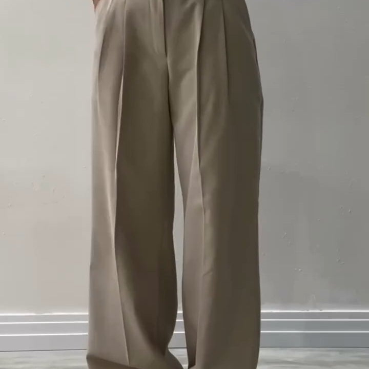 Pantalons larges à taille irrégulière en couleur unie pour femmes